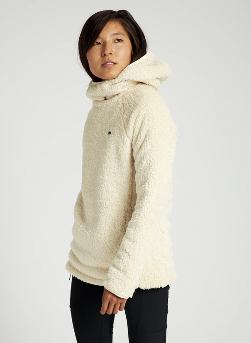 Model wearing a white pullover from Burton
