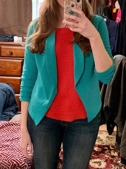 Amazon reviewer wearing a teal cardigan with a blazer-inspired design