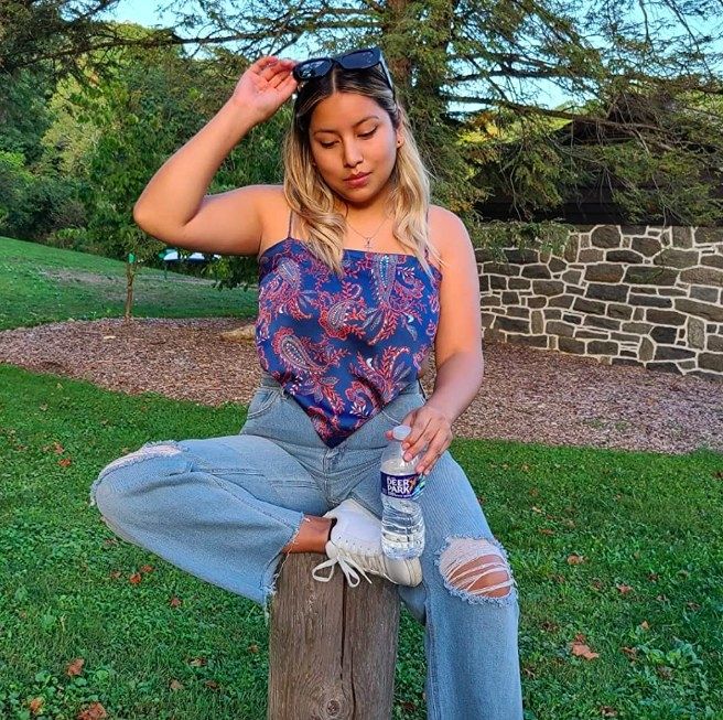 reviewer showcasing the bandana top