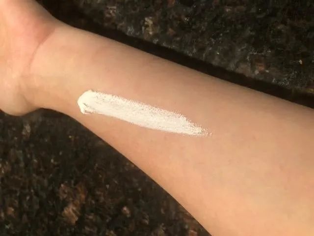 Reviewer's photo showing a swatch of the sunscreen applied to their forearm