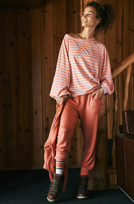 Model styled in a striped top from Free People Movement