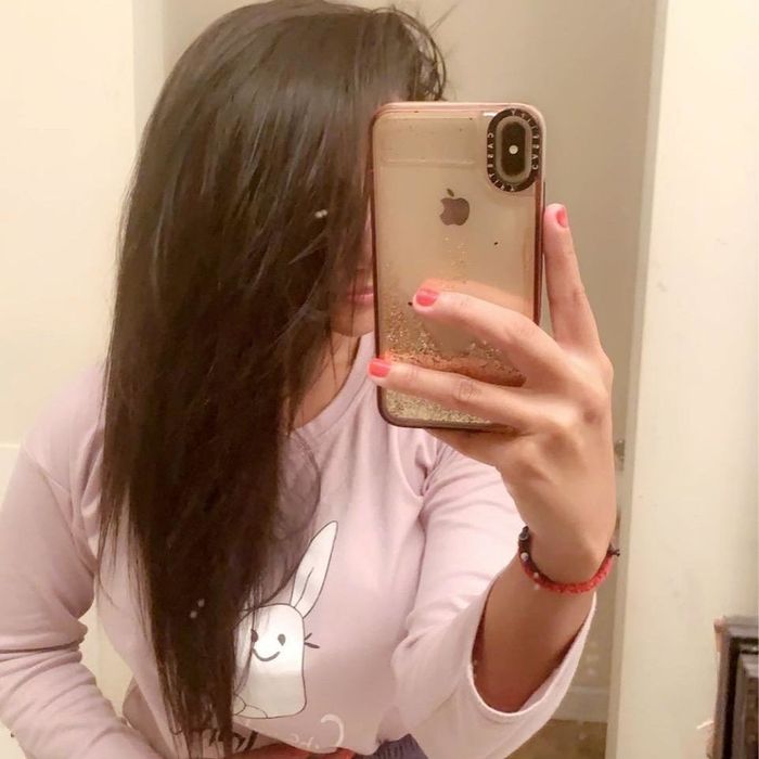 A reviewer's hair after applying Color Wow Dream Coat, showcasing its transformative results