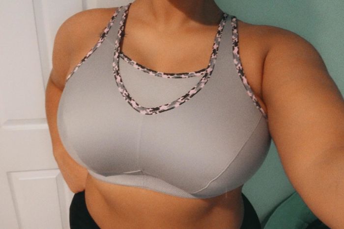 Reviewer modeling a gray bra
