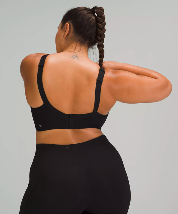 Model showcasing the black bra from the back