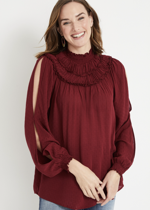 Editorial showcase of the blouse's runway-ready presentation