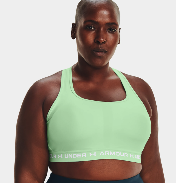 Model showcasing the green bra