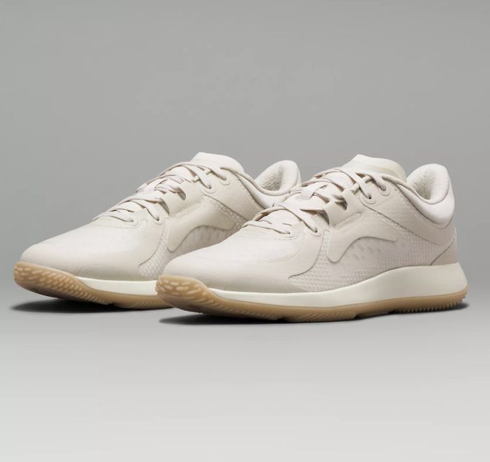 A pair of tan training shoes