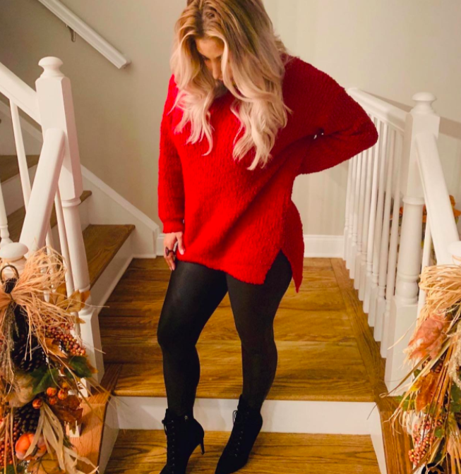 The ruby-red knit showcased during cozy weekend adventures
