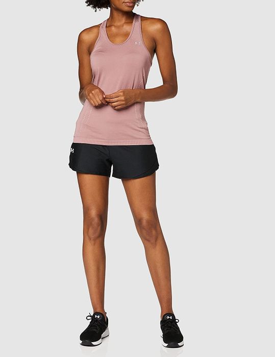 The black shorts are showcased on a model, highlighting their sleek and functional design.