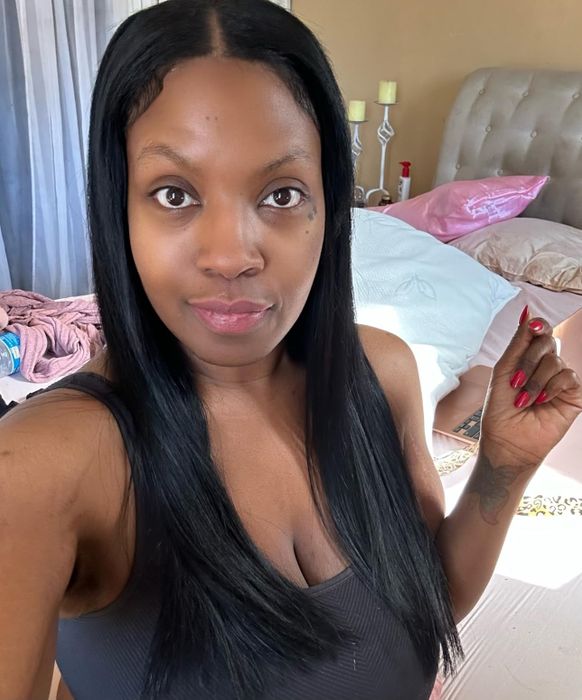 A reviewer's hair after applying the hair wax stick