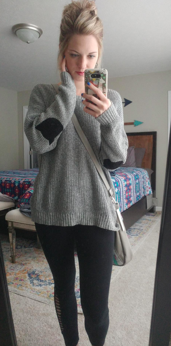Real-world styling of the gray knit showcasing its versatile silhouette