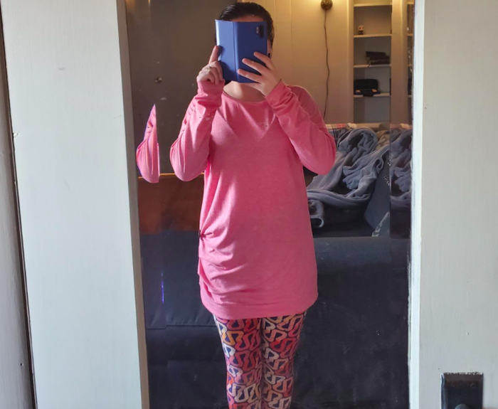 The blush pink top demonstrating daytime-to-dinner versatility