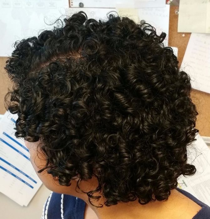 Reviewer displaying the results of using TGIN Butter Cream in their hair