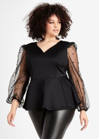 Editorial pairing of the onyx blouse with liquid-metal leggings for after-dark drama