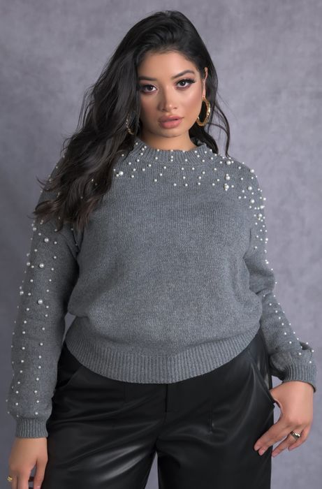 Stylist demonstrates the graphite knit paired with tailored onyx trousers