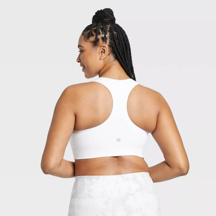 Model showcasing the white bra