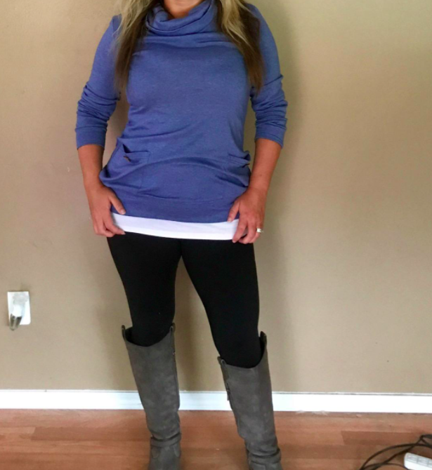 Styled to perfection in the navy blue draped-neck blouse