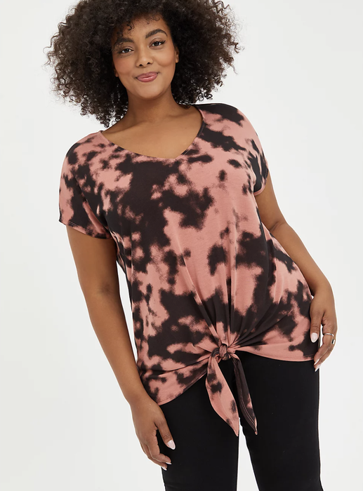 Street style alert: vibrant crimson and ebony tie-dye pattern pops against sleek black leggings
