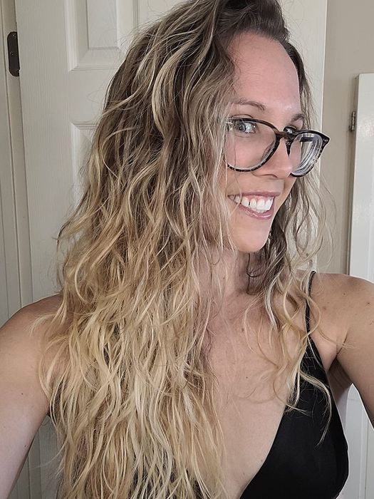 A reviewer's hair after applying Shea Moisture mousse