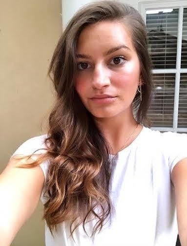 another image of Mytour Editor AnaMaria Glavan with wavy hair also parted to the side