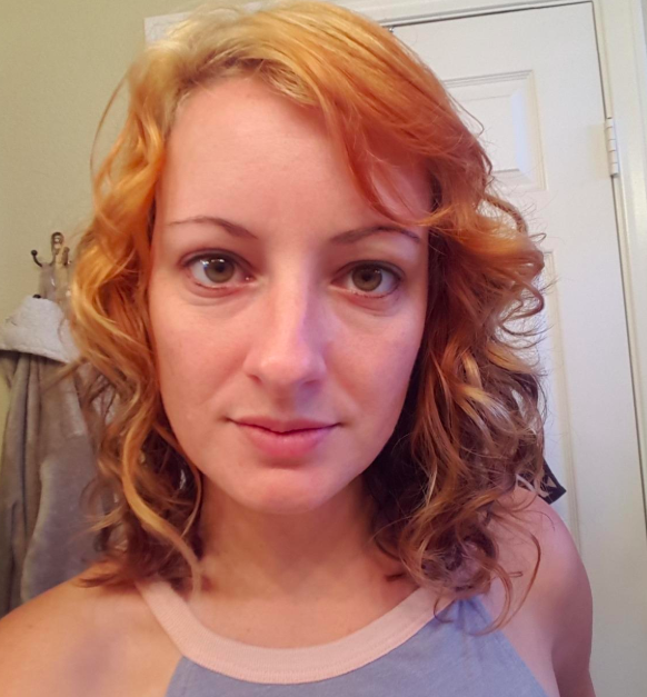reviewer showcasing curls after using the cream