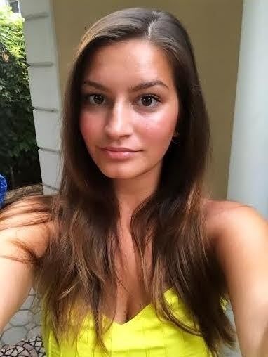 an image of Mytour Editor AnaMaria Glavan with straight hair parted to the side
