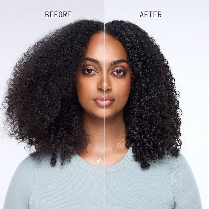 Woman showcasing a before-and-after hair transformation, from straight to curly, wearing a light top with a 'C' pendant necklace