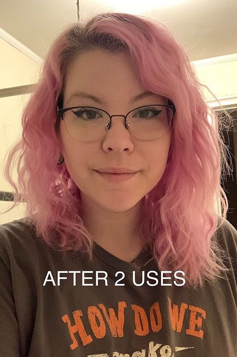 the same reviewer displaying smooth, sleek hair after two uses