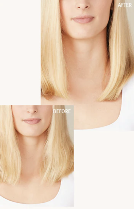 A model with straight hair demonstrating how this product has softened and repaired her hair, leaving it healthier after use.