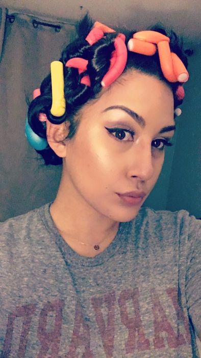 Reviewer wearing the curling rods