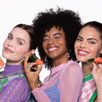 models holding bottles of blush while showcasing the blush on their faces