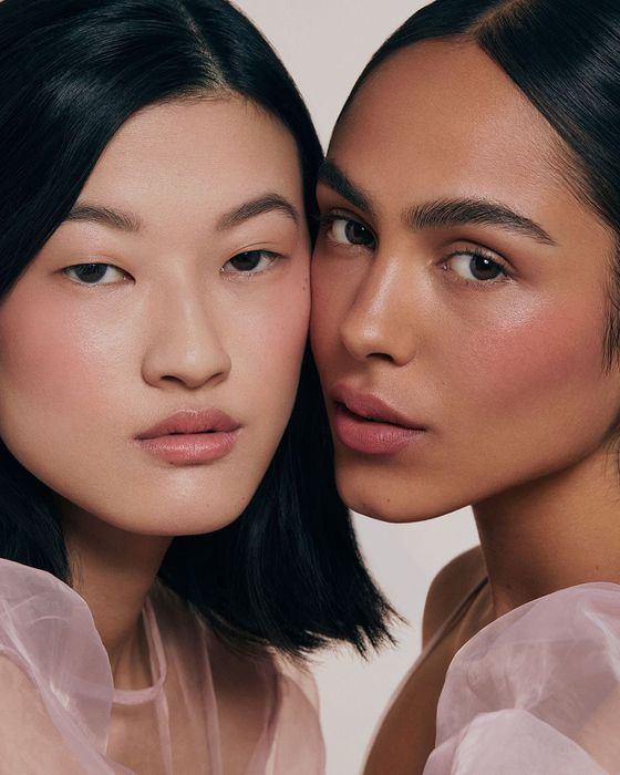 two models showcasing the multi-stick on their faces