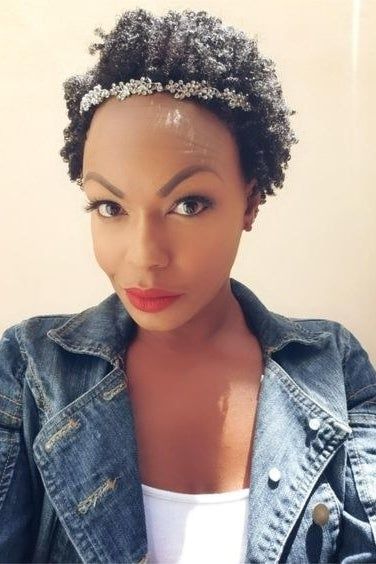 A reviewer with short coily hair showcasing her results after using the product