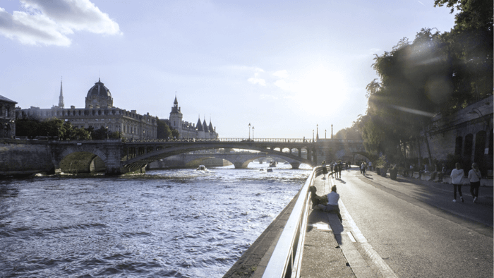 Picnicking by the Seine River in France