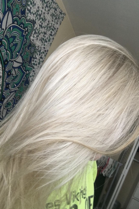 The same reviewer with freshly toned, white blonde hair.