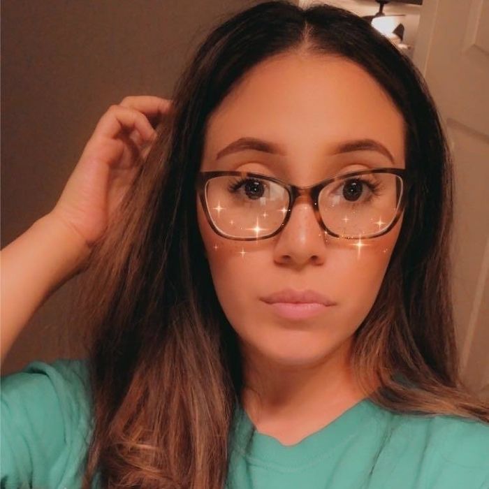 The same reviewer after straightening their hair with the hot air brush