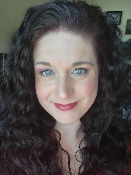 The reviewer's hair after using the Bed Head waver, now with soft, beachy waves.