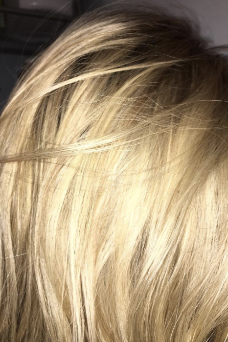 Reviewer with blonde hair showing before results.