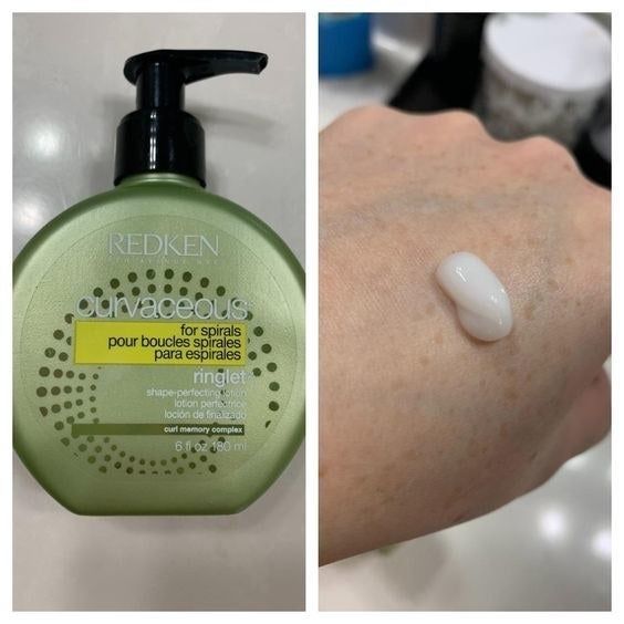 A reviewer’s photo of the bottle and a drop of the lotion on their hand