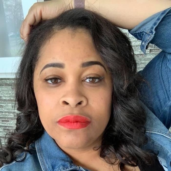 Reviewer showcasing the lipstick.