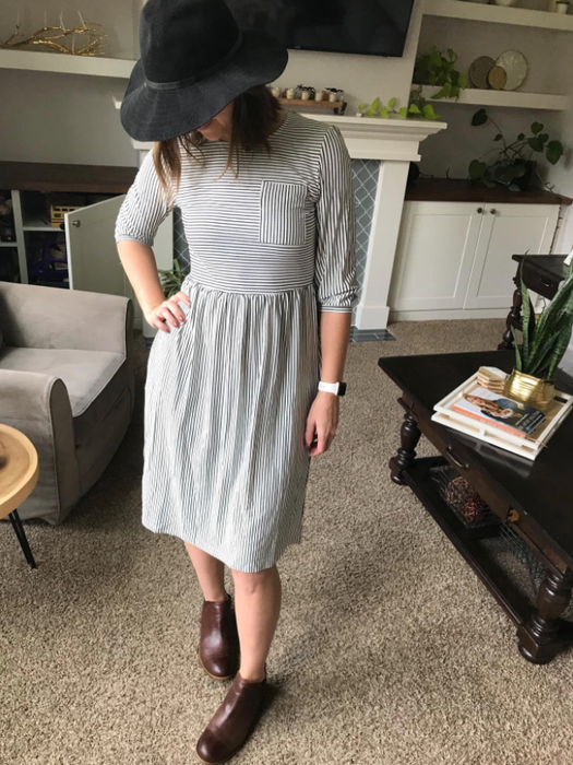 Reviewer wearing the striped dress