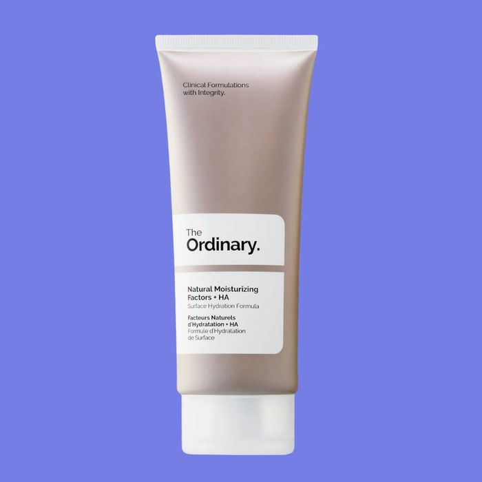 A tube of The Ordinary Natural Moisturizing Factors + HA, featuring a label that claims it offers non-greasy hydration for surface moisture.