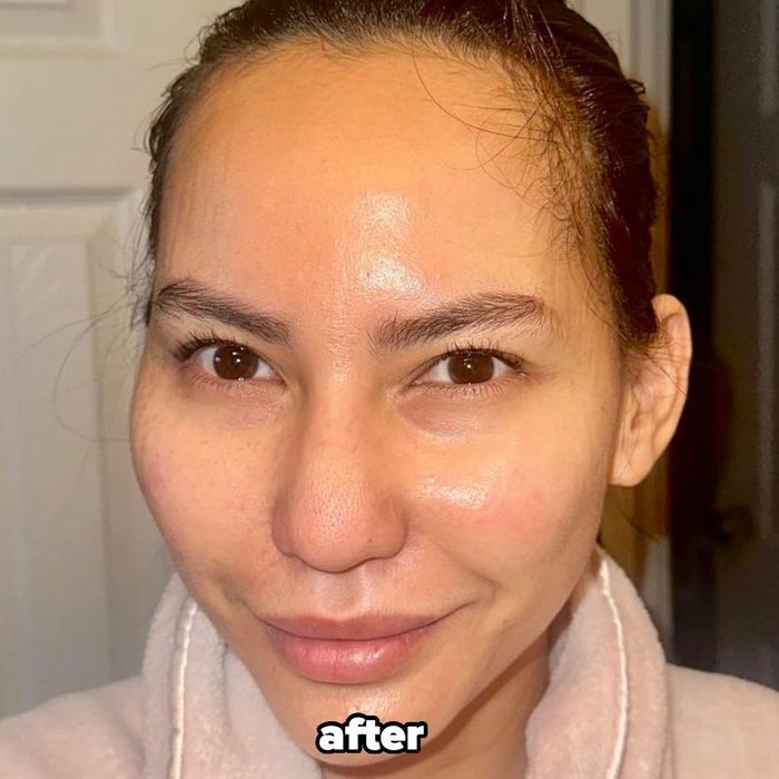 The reviewer after removing the mask, revealing radiant, glowing skin