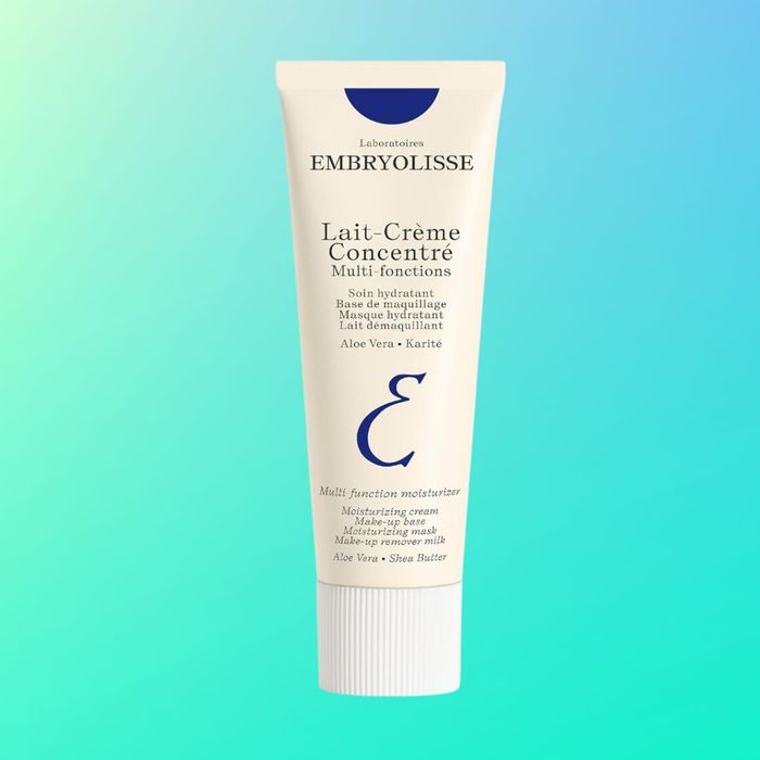 A tube of Embryolisse Lait-Crème Concentré, showcasing its versatility as a moisturizer, makeup primer, and mask, featuring aloe vera and shea butter