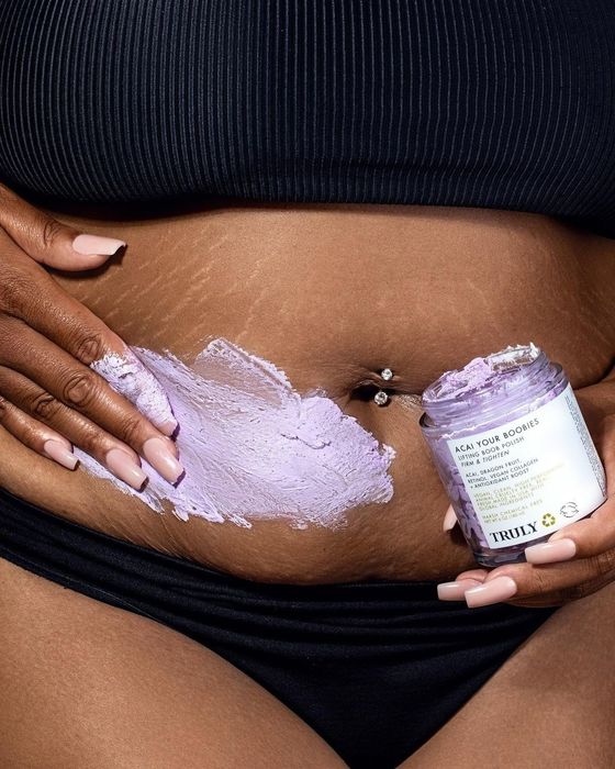 An image of someone applying the acai your bobbies polish to their stomach