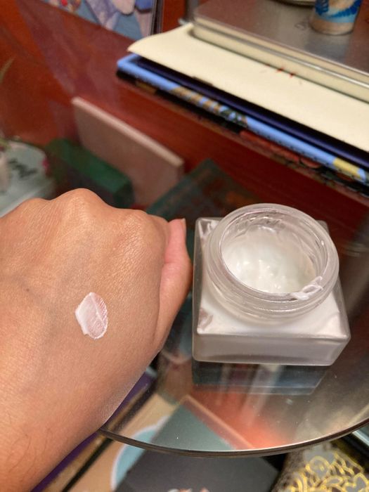 Swatch of the cream on a hand.