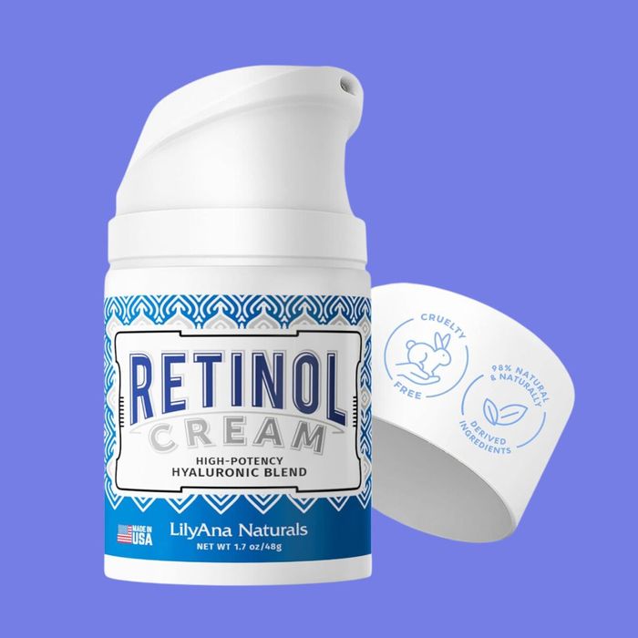 LilyAna Naturals Retinol Cream bottle, with the cap removed, showcasing its cruelty-free formula made with 85% natural ingredients.
