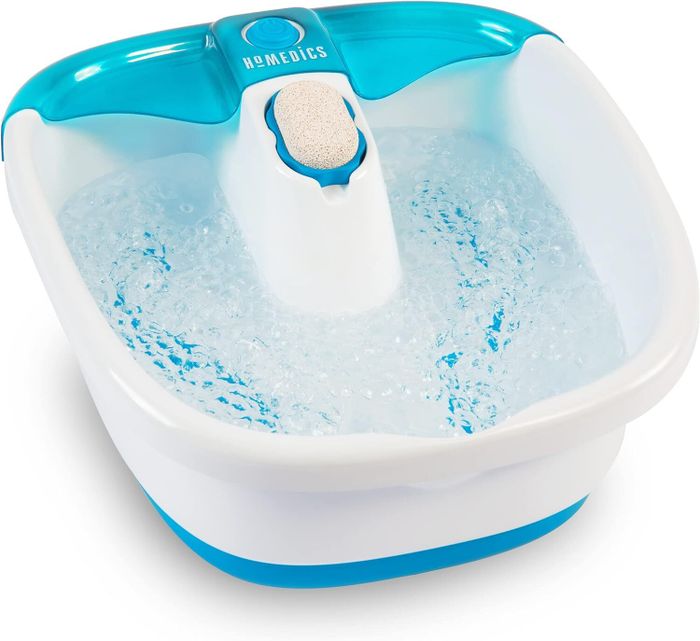 Homedics foot spa with soothing, bubbling water and a pumice stone attachment designed for effective foot care.