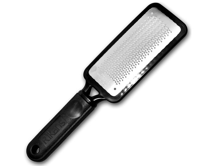 A RIKANS foot rasp featuring a black handle, designed to remove tough calluses and smooth your feet.