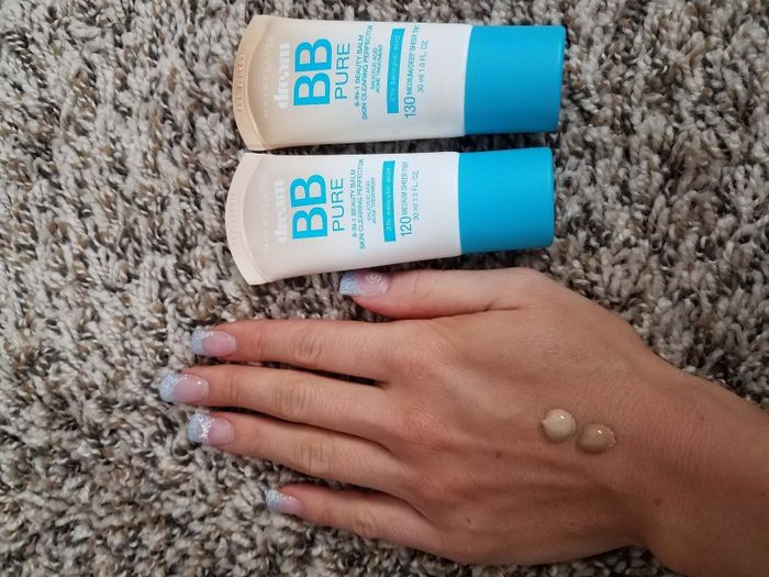 A dollop of the cream placed on a hand.